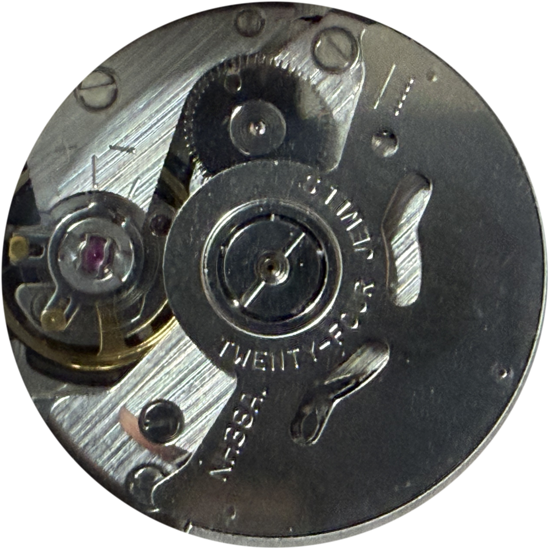 Automatic watch movement up close: rotor, gear train and balance wheel